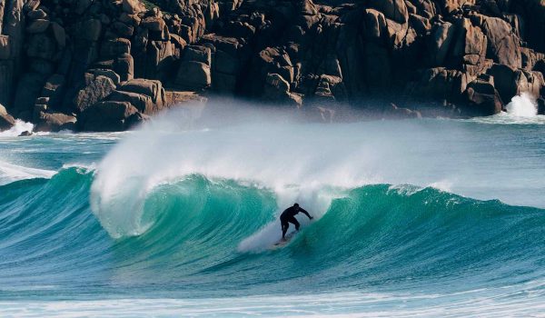 Surfer at Porthcurno